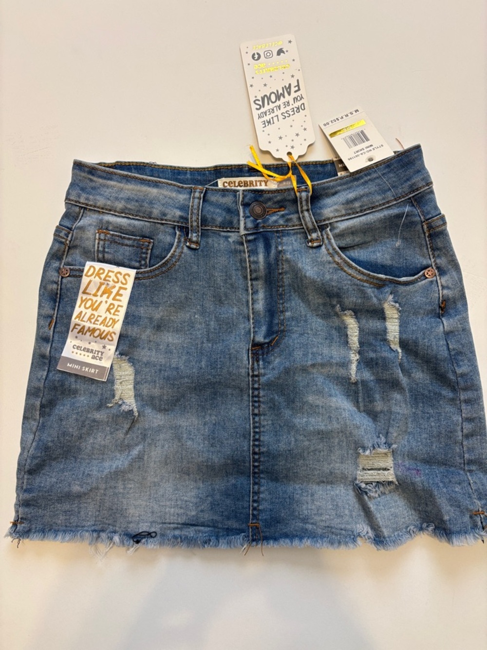 Celebrity Blue Distressed Denim Mini Skirt